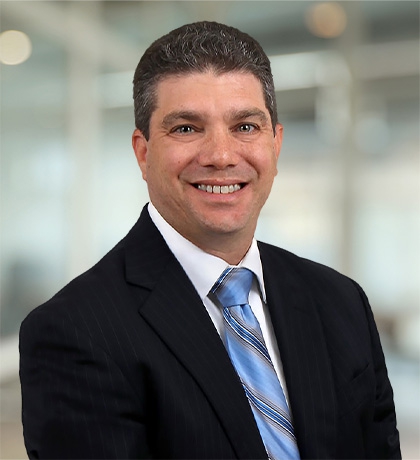 Kenneth A. Rosenberg, Partner at Fox Rothschild LLP seen in a white shirt and black color suit
